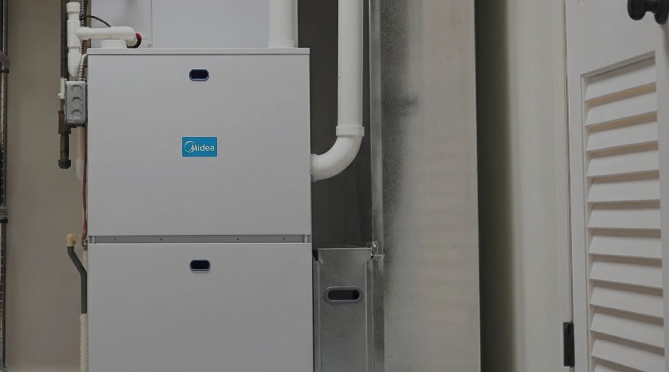 A Midea Furnace installed in the basement of a house